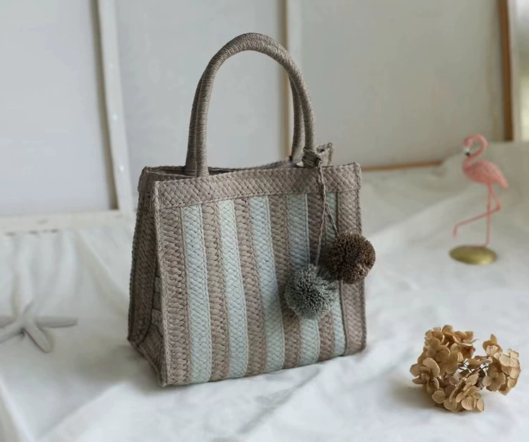 Bolso de mano de paja a rayas tejido con pompones, bolso de mano vertical mediano con diseño abierto estilo arte chino vintage para uso diario